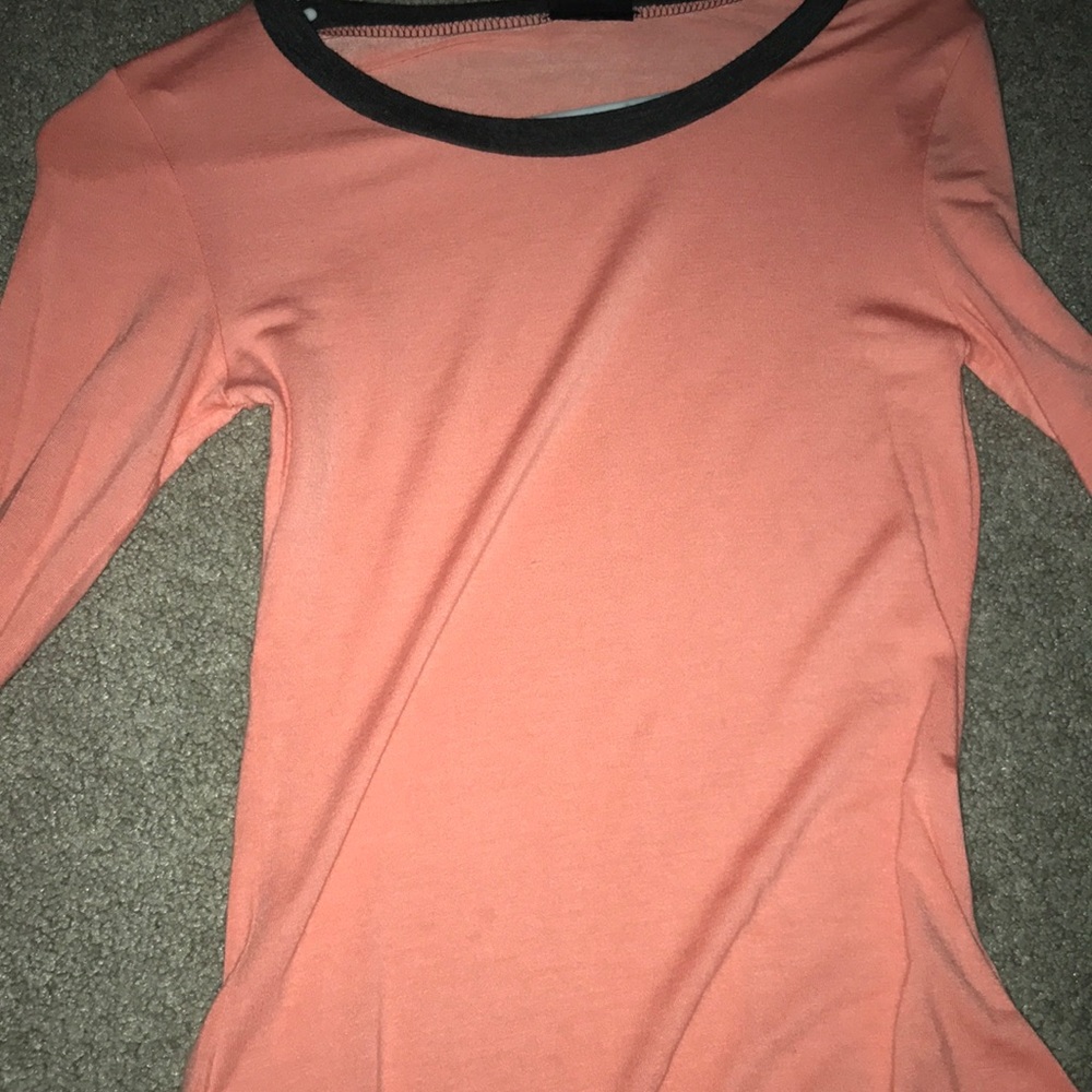 orange/peach shirt
